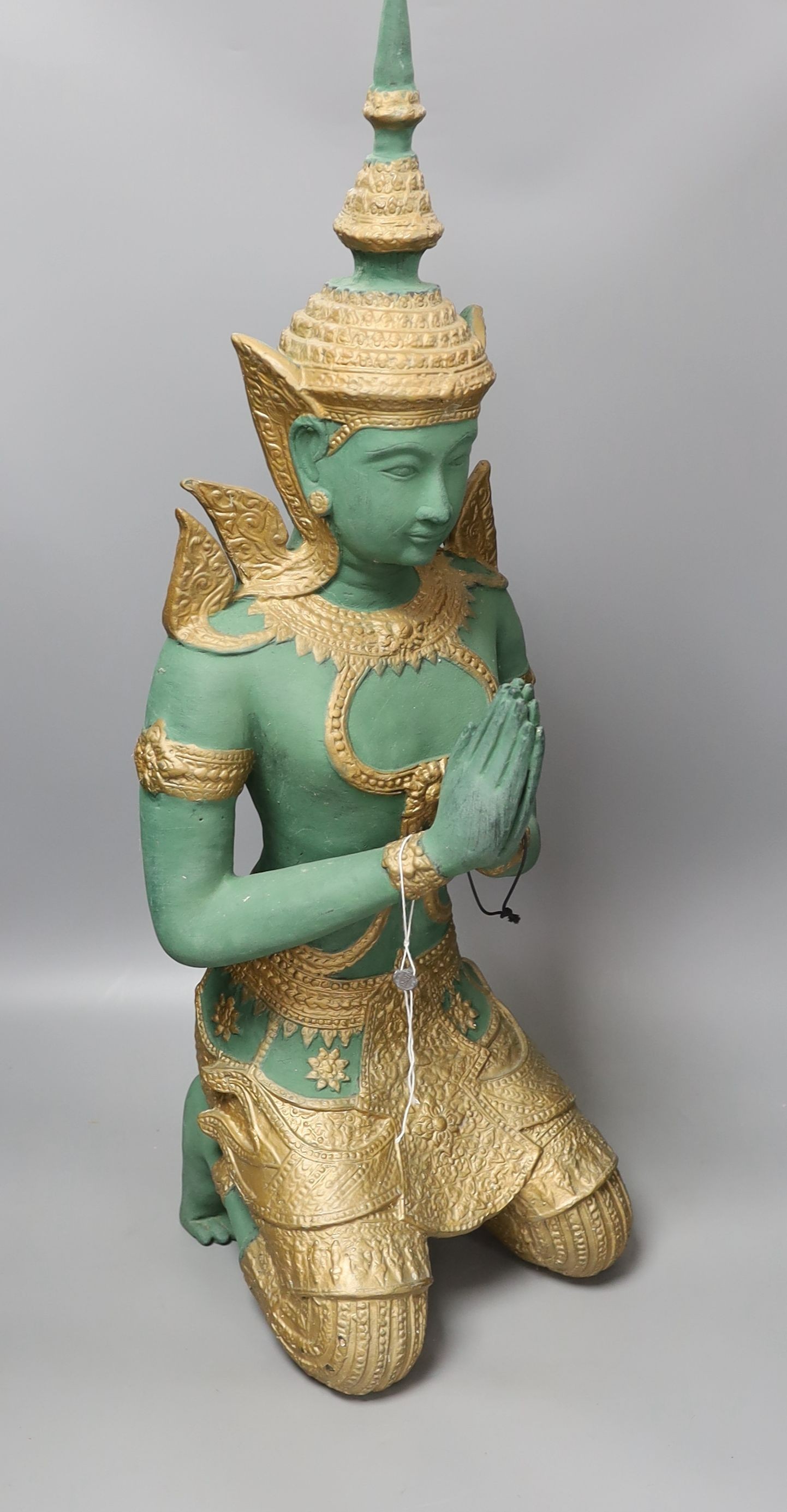 A Thai painted alloy of a kneeling Buddha - 69cm tall